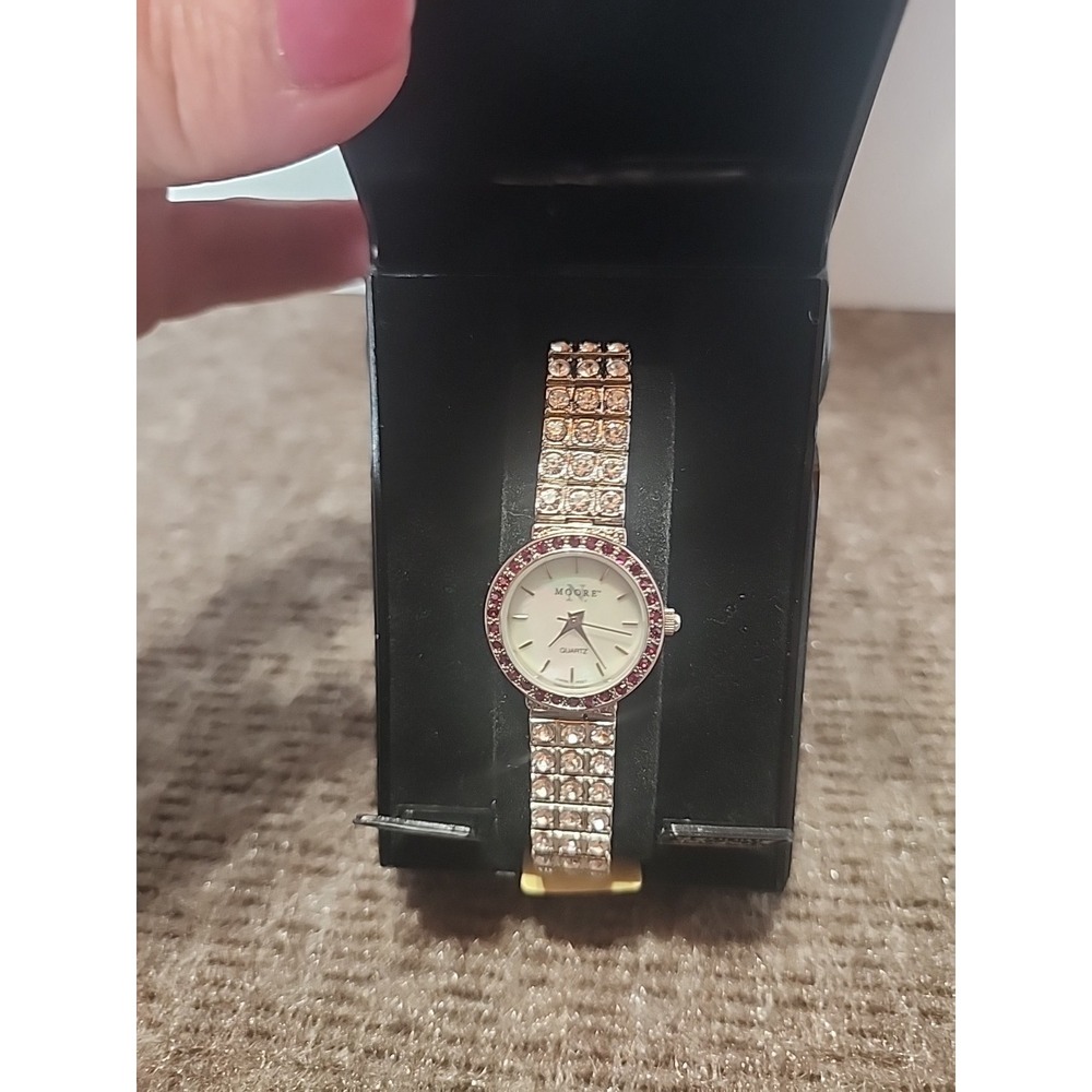Moore Couture genuine crystal wristwatch‎ is packaged W/ box